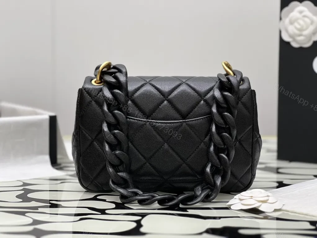 View 9 of Compact Quilted Black Flap Bag with Gold Hardware, Chain Carry