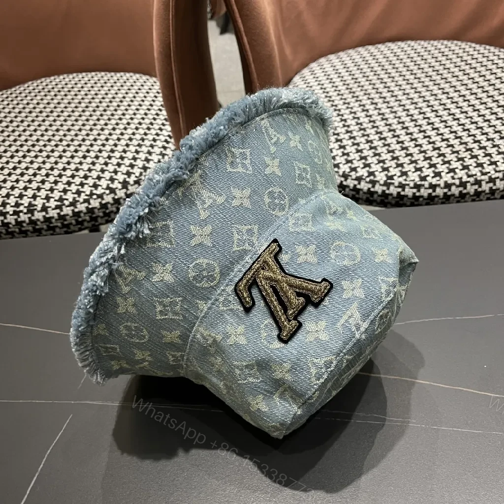 View 6 of Denim Bucket Hat with Monogram Detail – Casual Luxury & Comfort