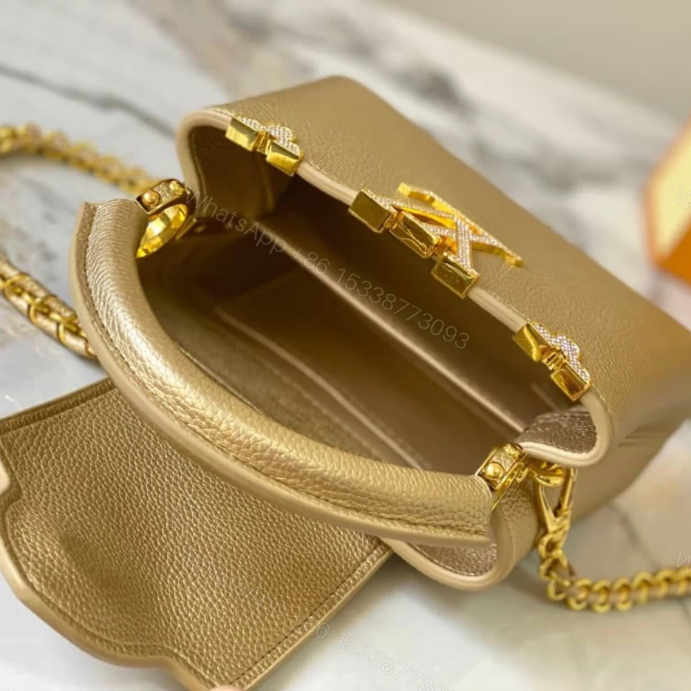 View 8 of Louis Vuitton Capucines Bag Gold 21Cm M24583