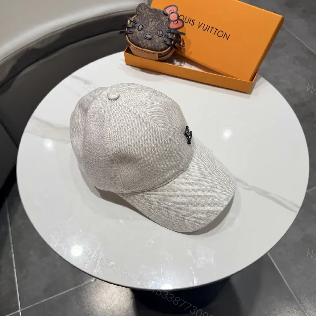View 3 of Cozy Chic Cap: Subtle LV Logo, All-Season Cotton blend Cap