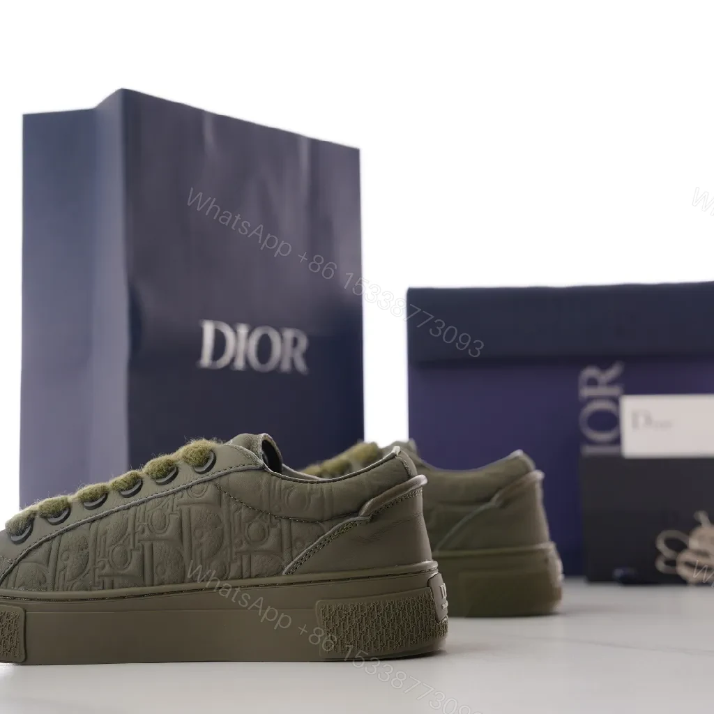 View 7 of Olive Luxe Olive Suede-Leather High-Top Sneaker with Monogram Embossing