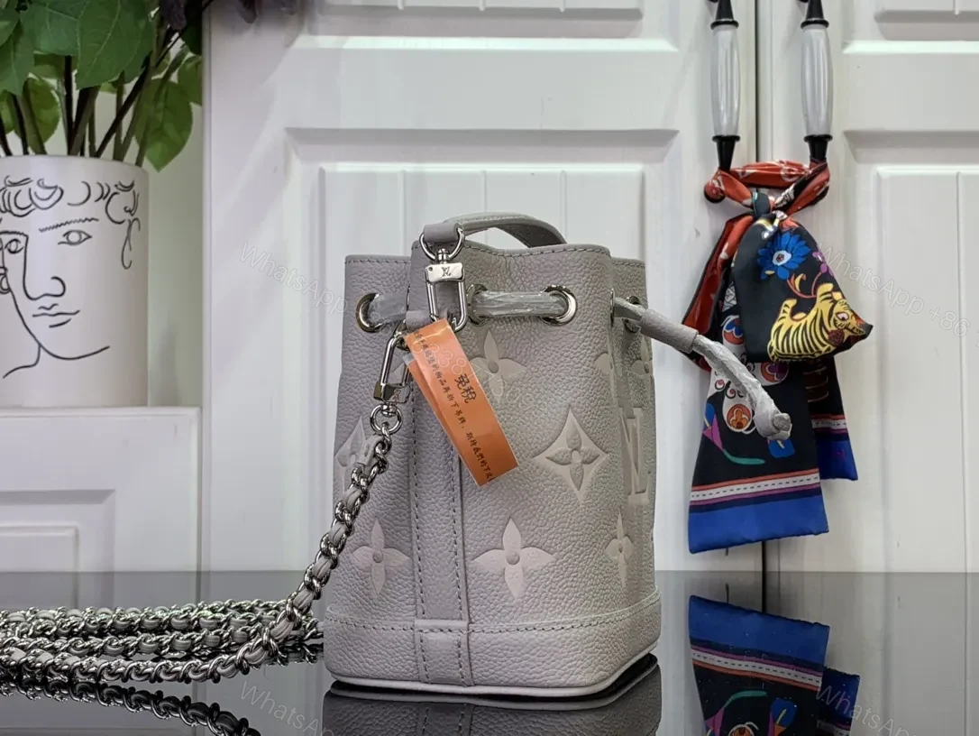 View 6 of Soft-Shadow Monogram Bucket Bag: Modern Texture, Subtle Luxury