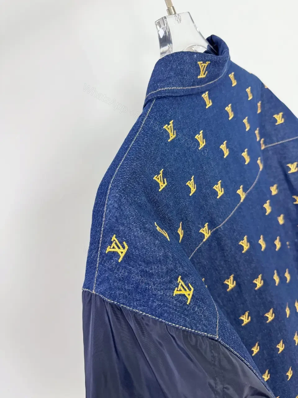 View 4 of Denim Bomber Jacket with Gold Monogram Detailing and Contrast Sleeves