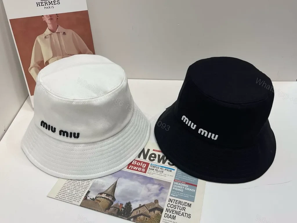 View 3 of Monochrome MIU MIU Cap: Subtle Logo, Everyday Luxury
