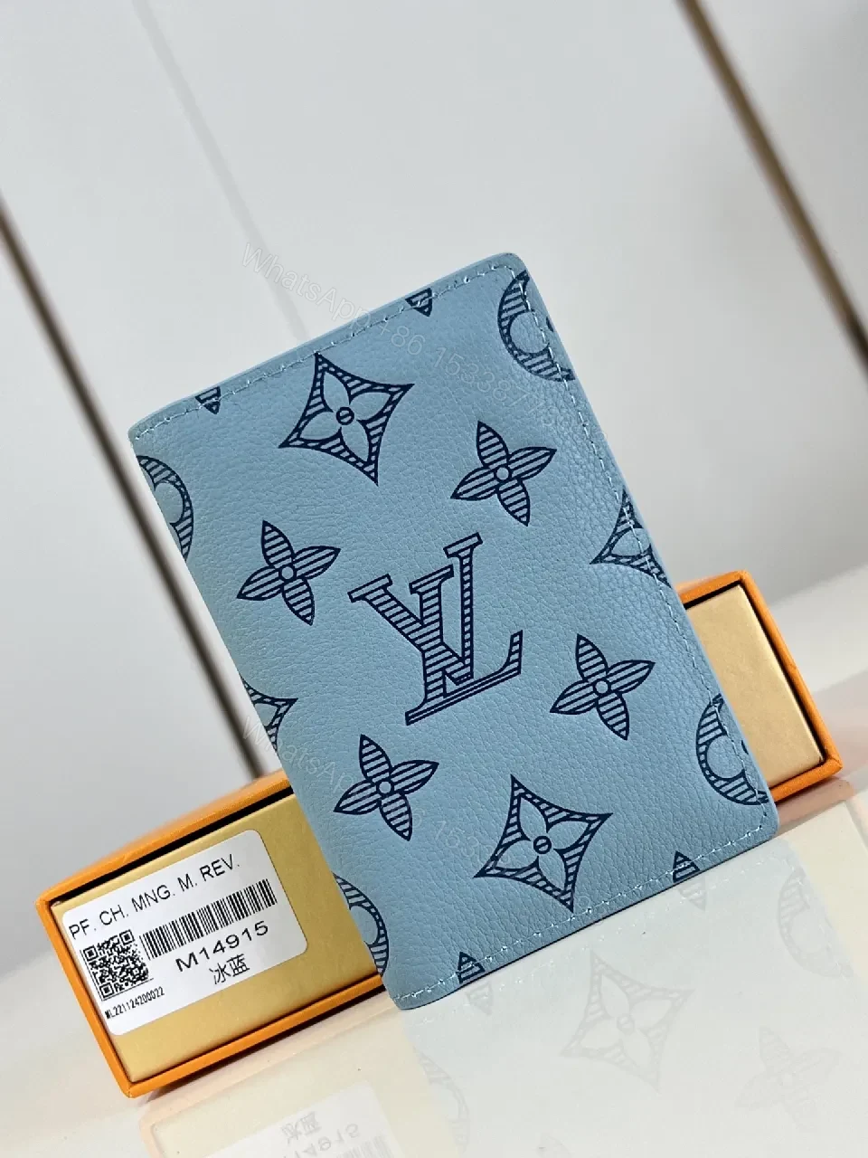Light Blue Monogram Wallet — Signature Calfskin, Bi-Fold, Luxe Practicality — view 1