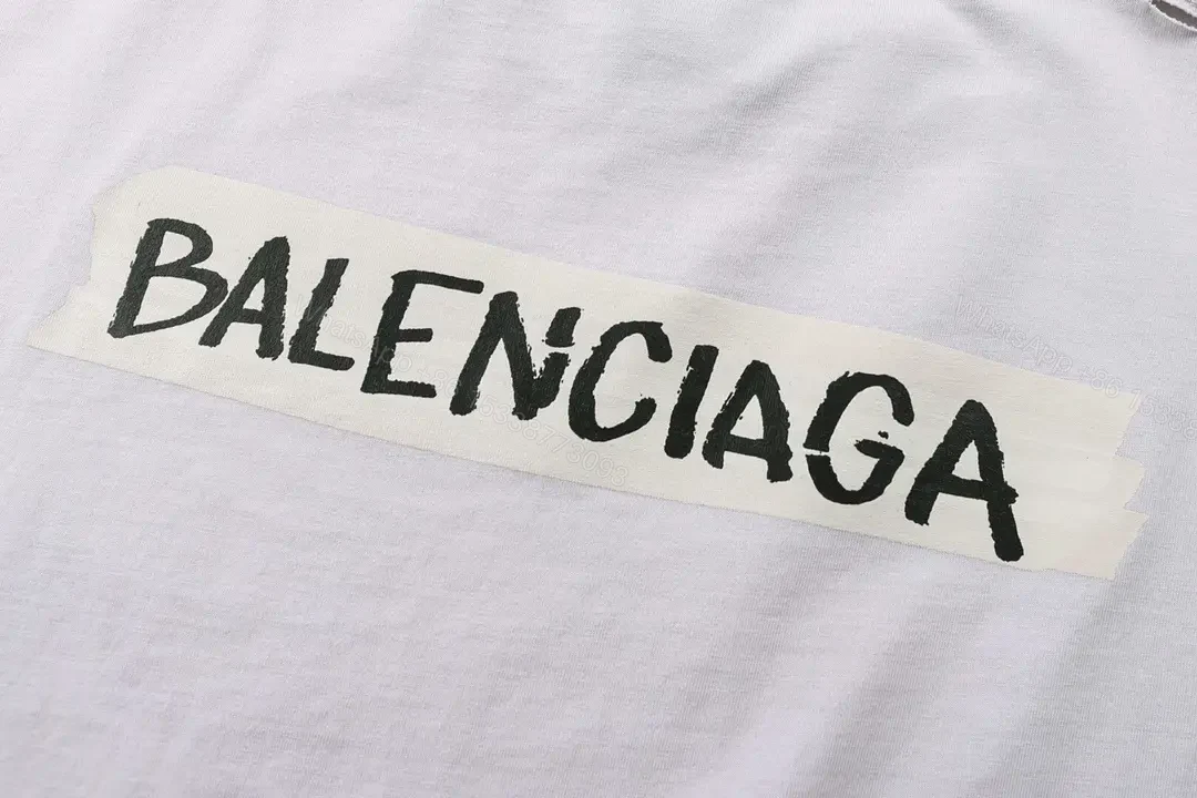 View 9 of Minimal White Cotton Tee: Subtle Logo, All-Day Comfort