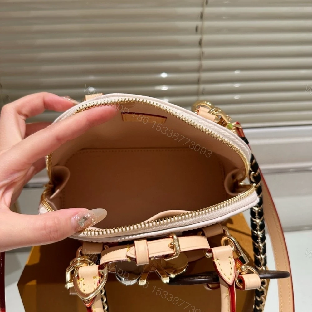 View 6 of Louis Vuitton Alma Mini LV And I Monogram Dune 25Cm K00015