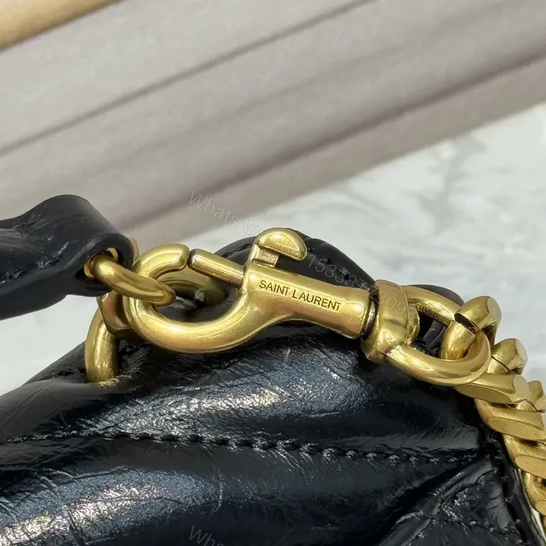 View 9 of Structured Quilted Leather Handbag with YSL Crest
