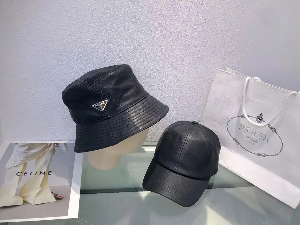 View 4 of Black Leather-Texture Bucket Hat with Prada-Inspired Logo