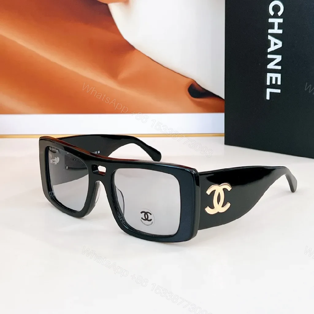 Bold Chanel Sunglasses: Black Acetate, Interlocking CC Logo — view 1