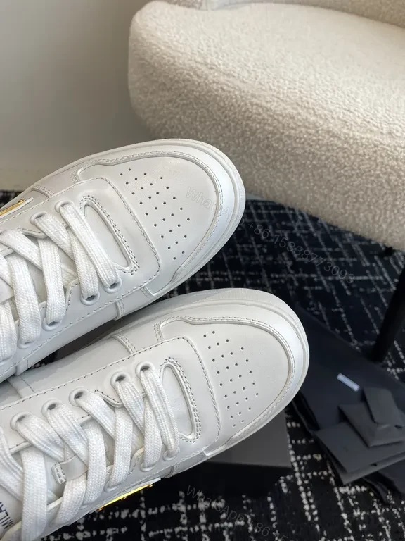 View 8 of Minimalist White Leather Suede-Trim Sneakers: Luxury Comfort