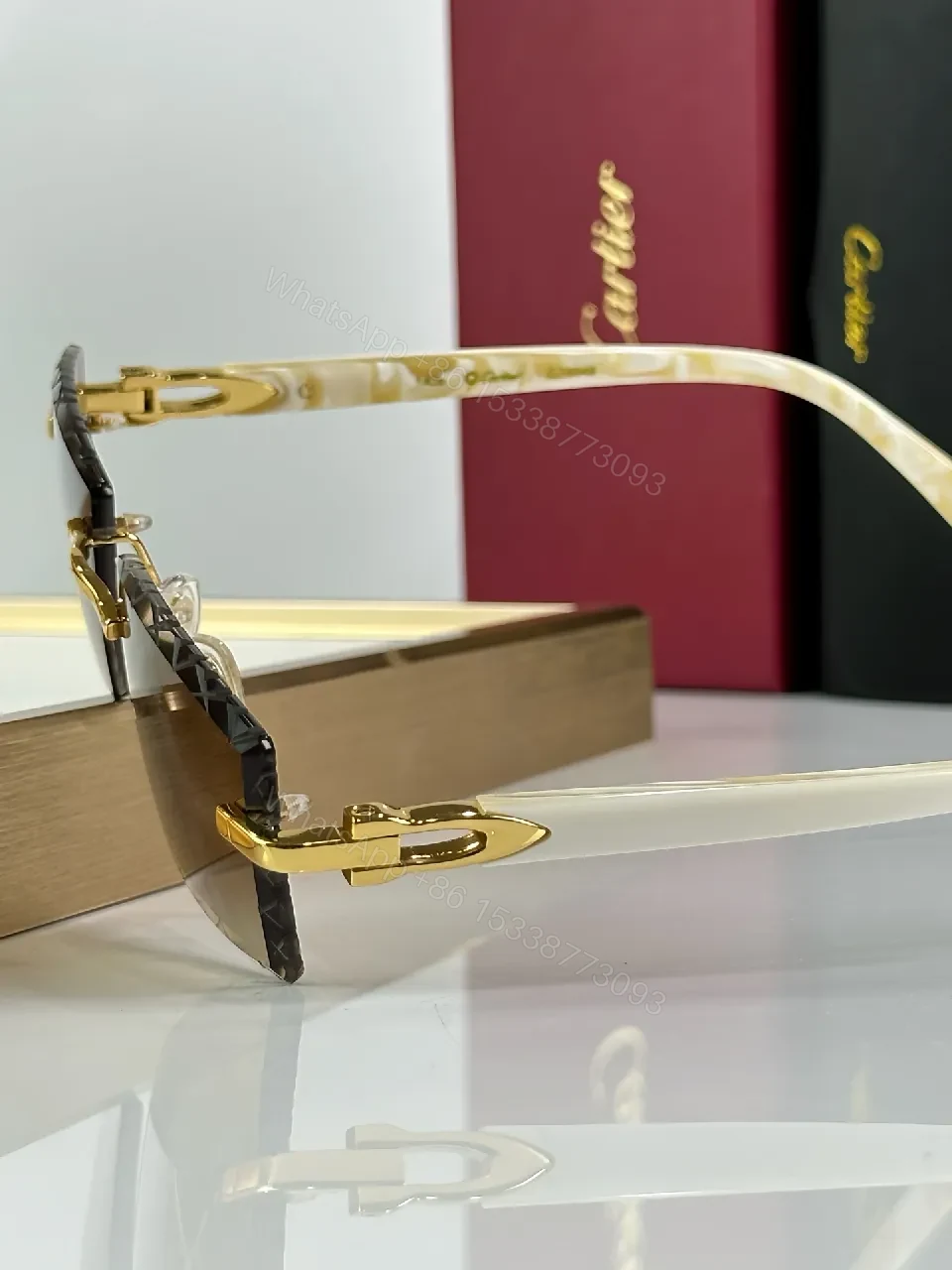 View 2 of Rimless Shield Sunglasses: Gold Accents, Luxury Minimalism