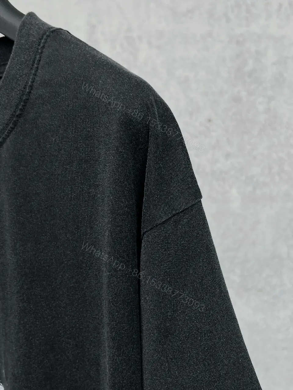 View 6 of Oversized Black Cotton Tee with Distressed Logo – Avant-Garde Streetwear