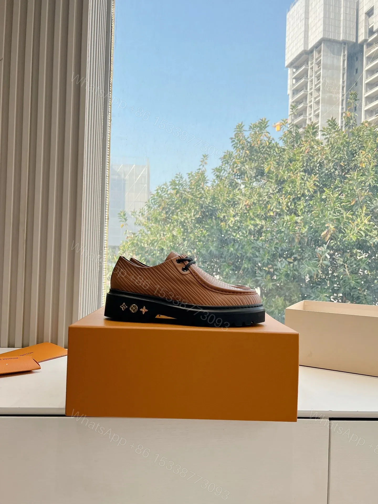 View 2 of LV Women Brown Textured Leather Loafers