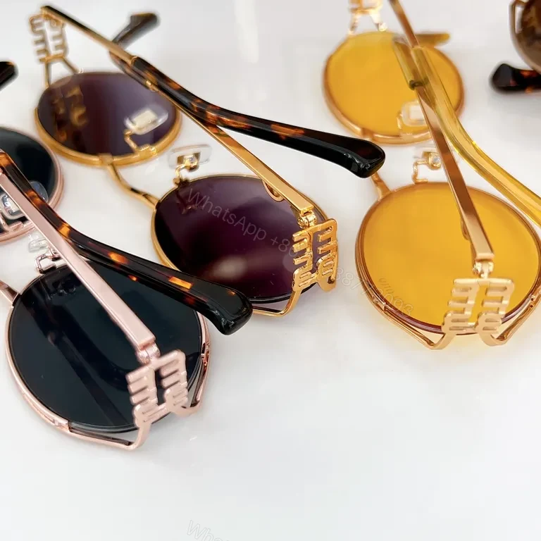 View 2 of Gold Tone Miu Miu Round Sunglasses â€“ Luxe Everyday