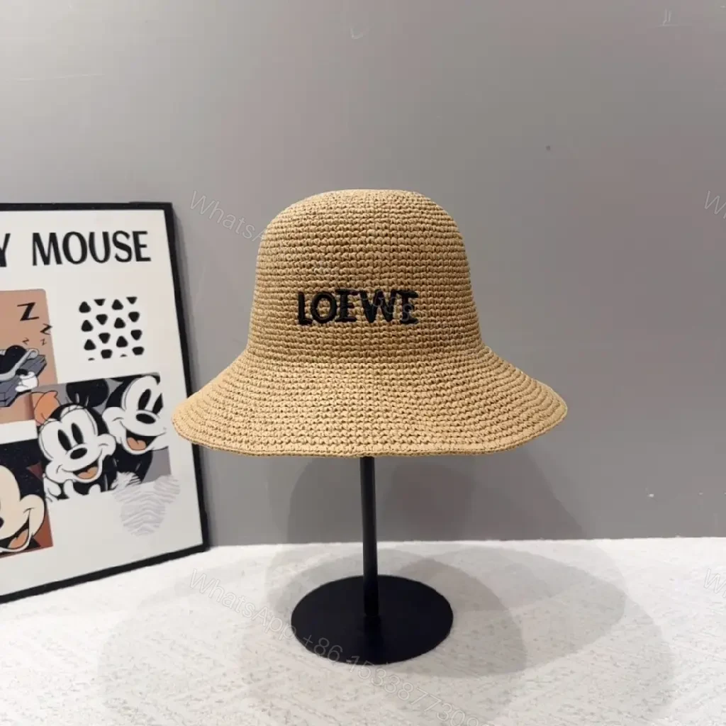 View 2 of Natural Straw Bucket Hat with LOEWE Embroidery