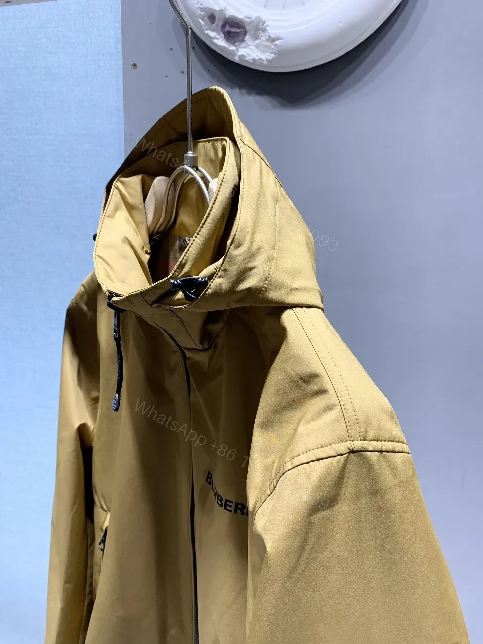 View 9 of Compact Camel Weatherproof Jacket with Clean Lines, Lightweight Comfort