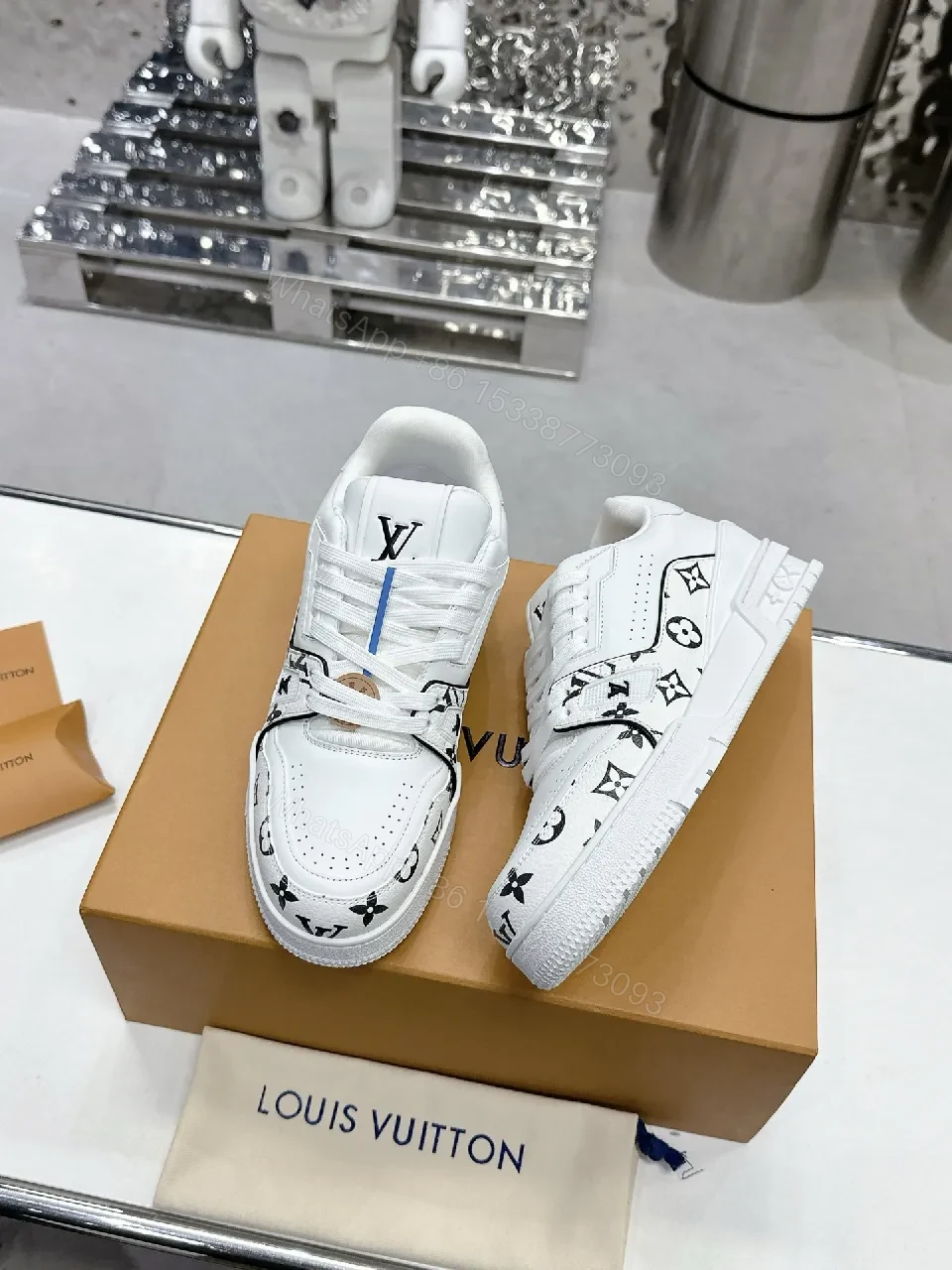 View 8 of White Leather Sneaker, Monogram Motif, Luxe Street Style, Designer Flair, Sneaker