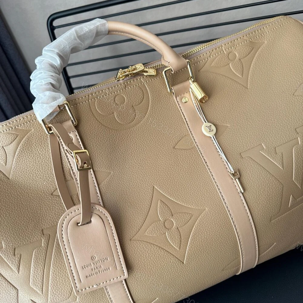 View 3 of Louis Vuitton Keepall 45 Beige 50Cm M46114