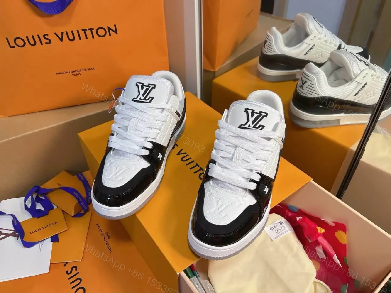 View 4 of Two-Tone Luxe Sneaker: Premium Comfort & Monogram Accent