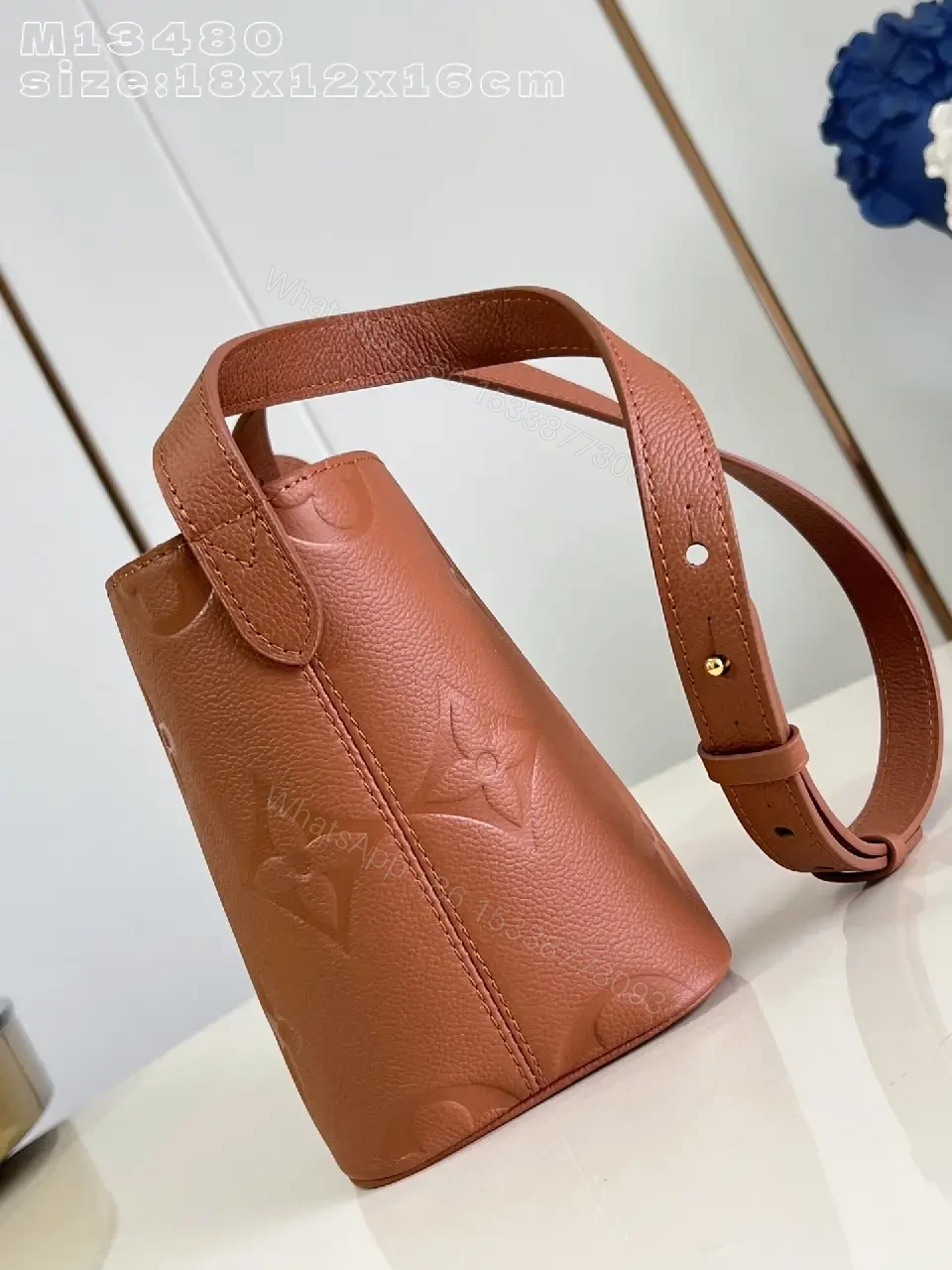 View 6 of Soft-Tone Cropped Bucket Bag with Monogram Embossing Bag