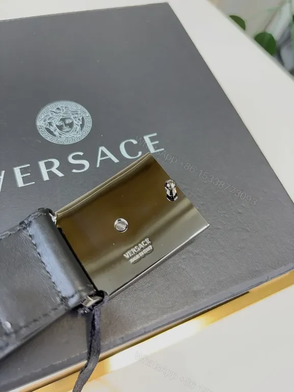 View 7 of Minimalist Leather Belt with Lion Buckle â€“ Versace Luxury Belt