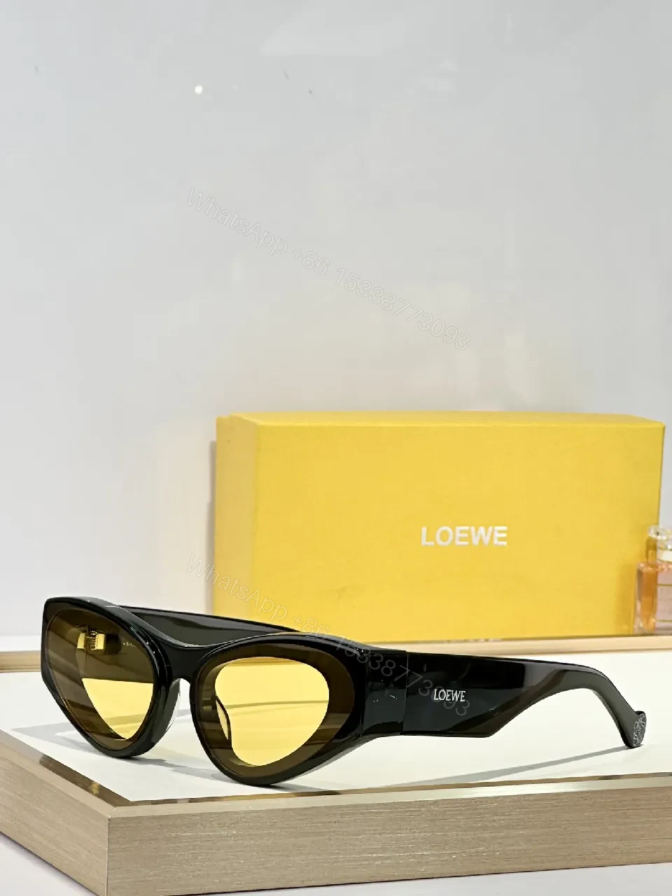 Bold Black Acetate Cat-Eye Sunglasses with Polarized Yellow Lenses — view 1