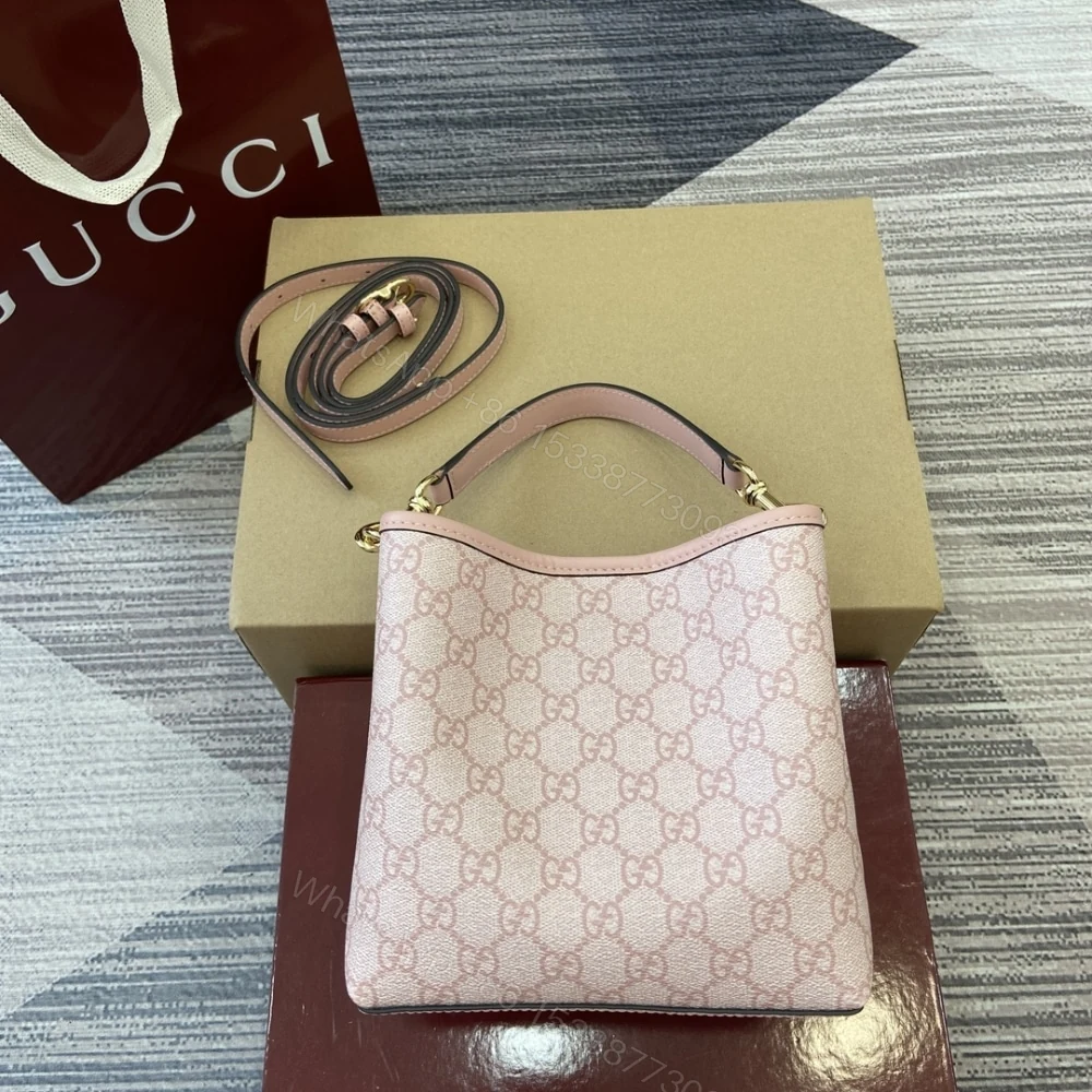 View 2 of GUCCI GG EMBLEM SMALL BUCKET BAG LIGHT PINK COATED FABRIC 21CM 815118 FAD6L 8459