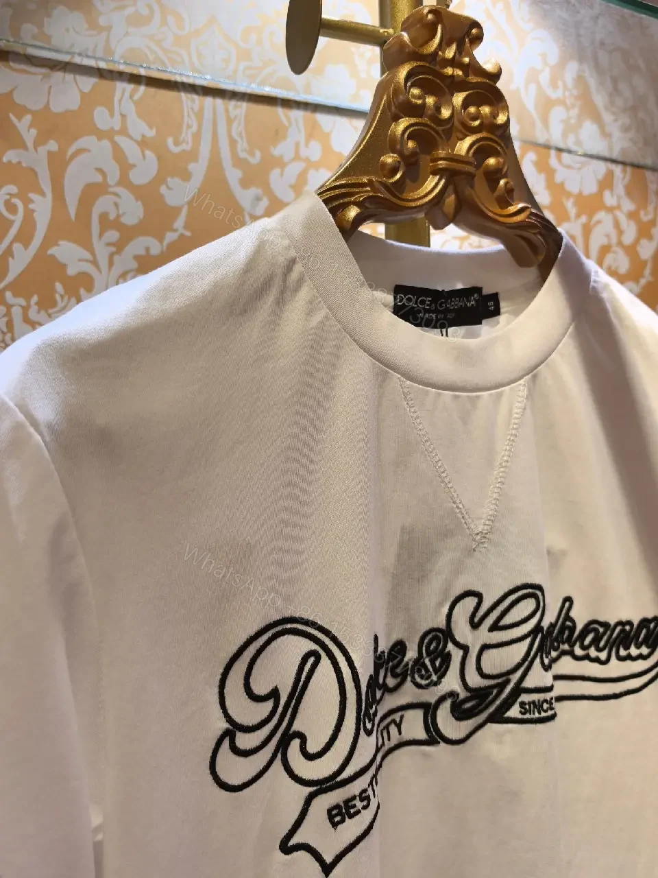 View 6 of Minimalist White Cotton Tee with Subtle Front Logo and Patches