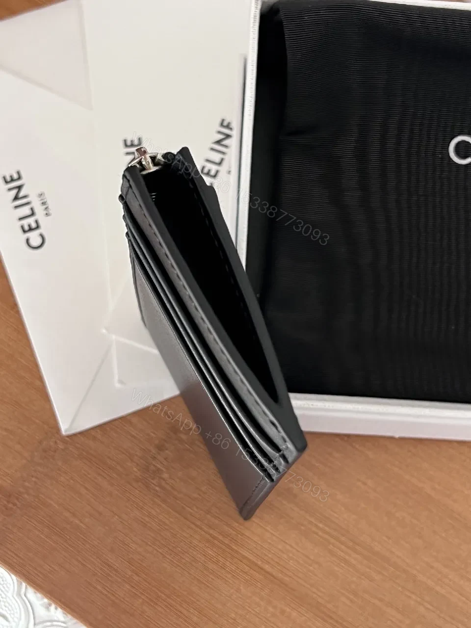 View 3 of Minimalist Black Cardholder: Bold CELINE Print, Compact Luxury