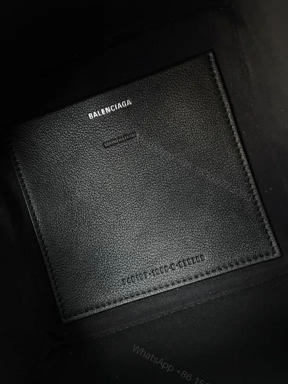 View 2 of Balenciaga Mini Bag: Black Textured Leather, Logo-Centric Chic