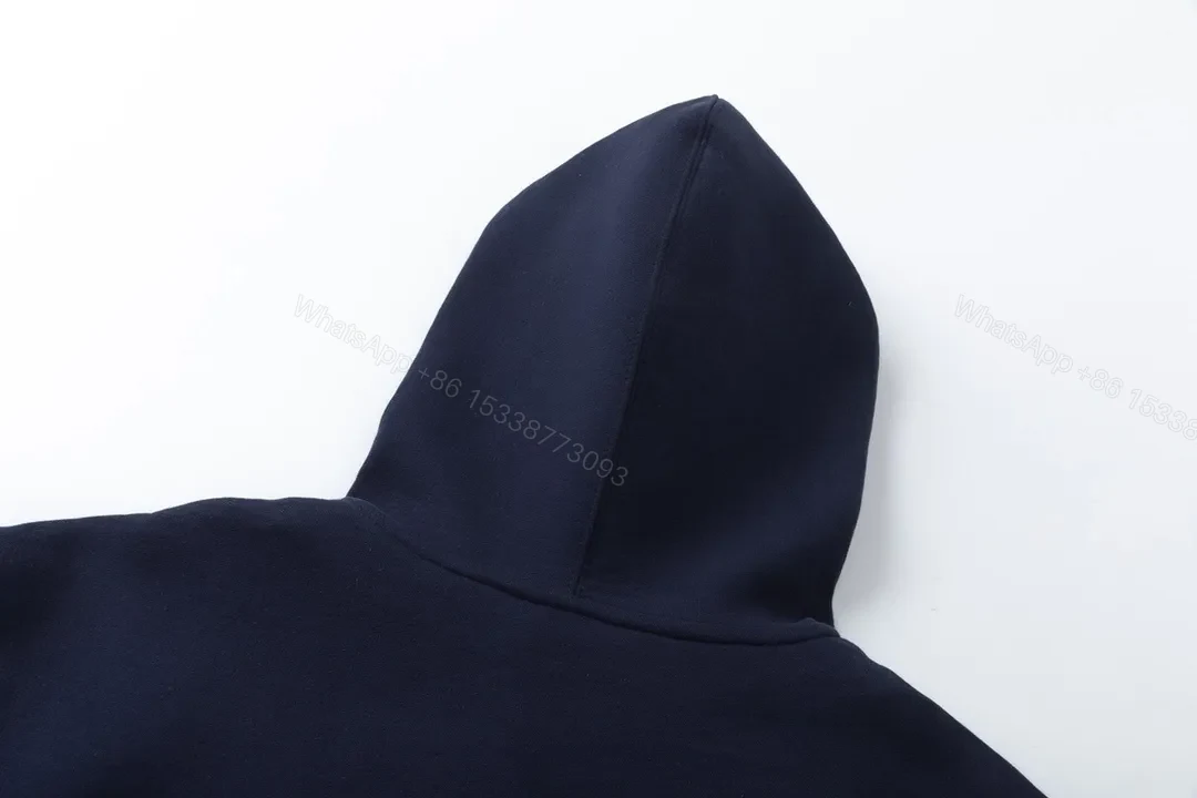 View 10 of Minimalist Navy Zip Hoodie—Cotton Blend, Modern Fit, Logo Accent, Hoodie