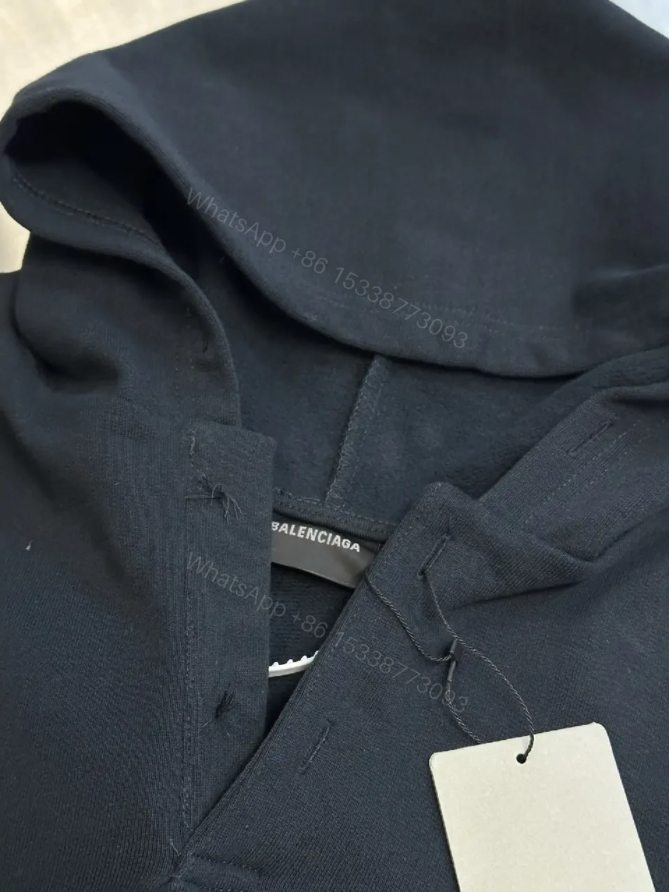 View 10 of Cozy Luxe Hoodie: Subtle Iconography, Everyday Versatility