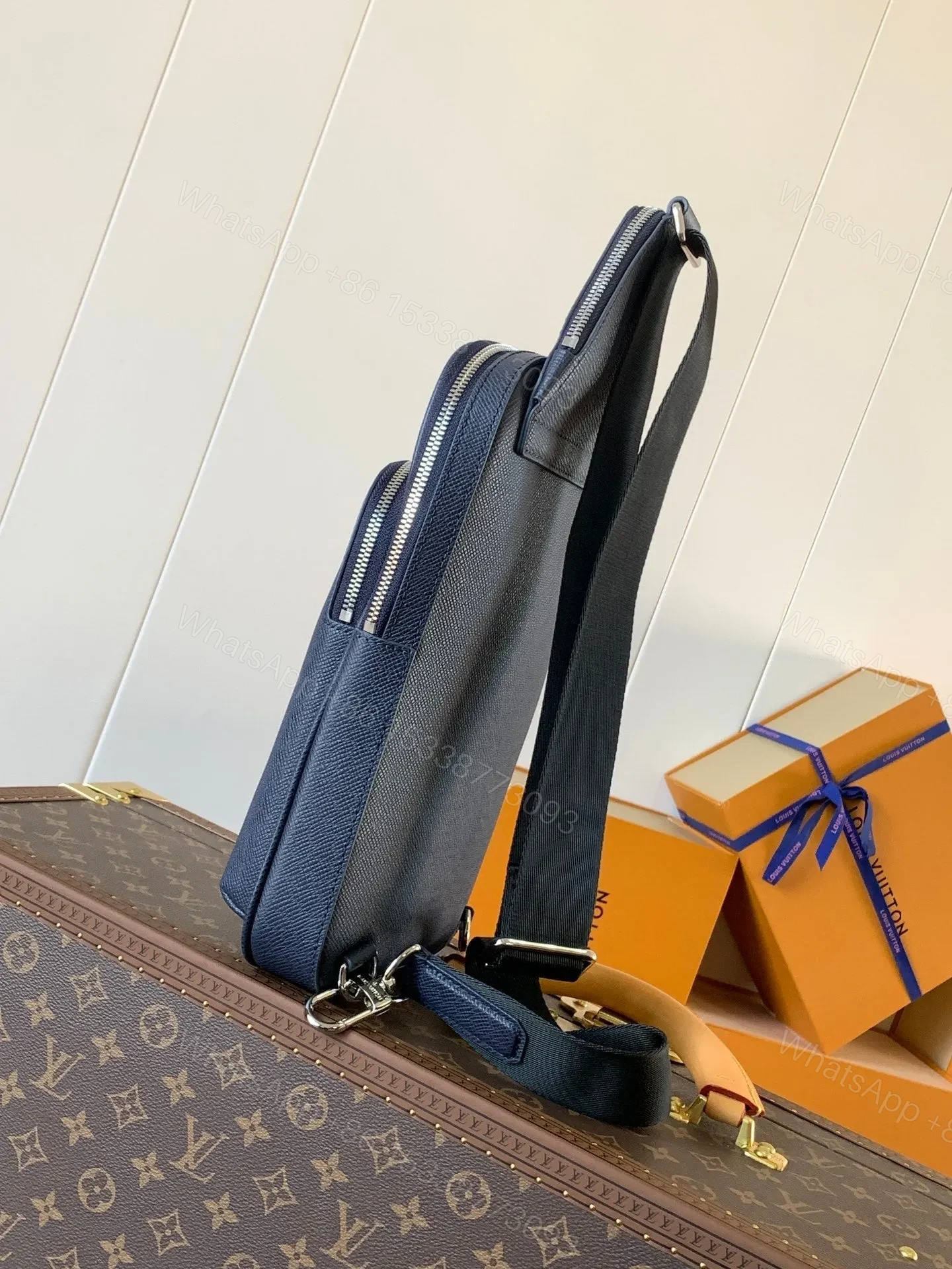 View 3 of LV AVENUE SLINGBAG 31 IN NAVY BLUE TAIGA LEATHER