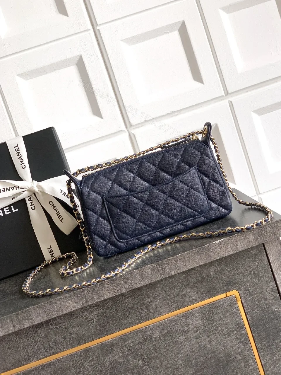 View 2 of Navy Quilted Crossbody: Gold-Emblem, Compact Luxury Bag