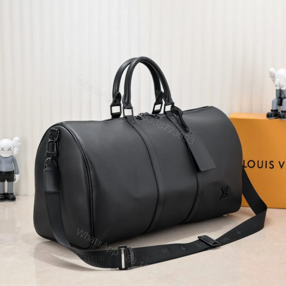 View 3 of Louis Vuitton Keepall Bandoulière 50 Black M21420