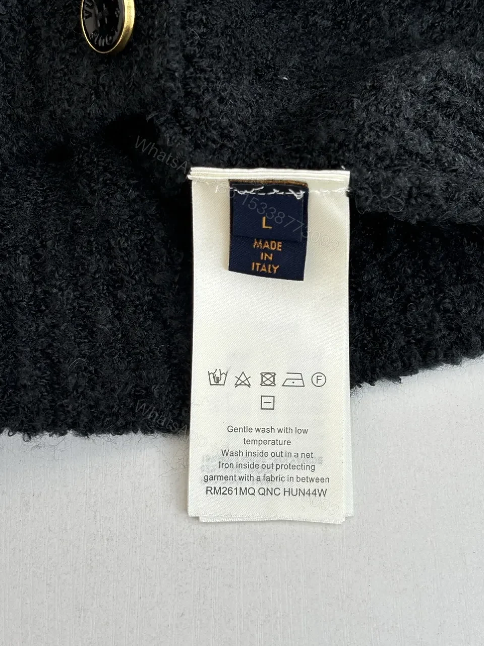 View 5 of Textured Bouclé Knit Cardigan - Subtle LV Logo, Versatile Warmth