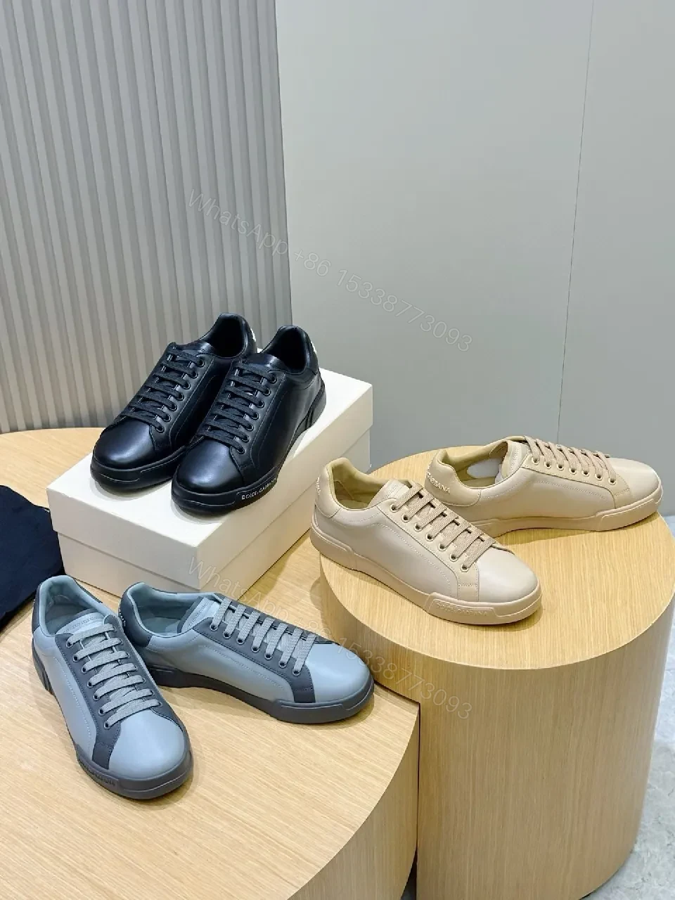 View 4 of Minimal White Leather Sneakers with Subtle Designer Detailing