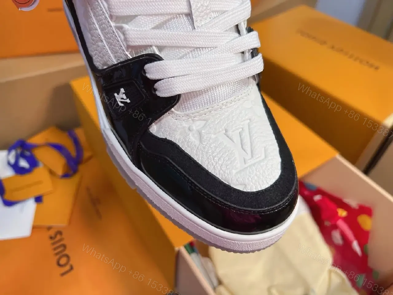 View 3 of Two-Tone Luxe Sneaker: Premium Comfort & Monogram Accent