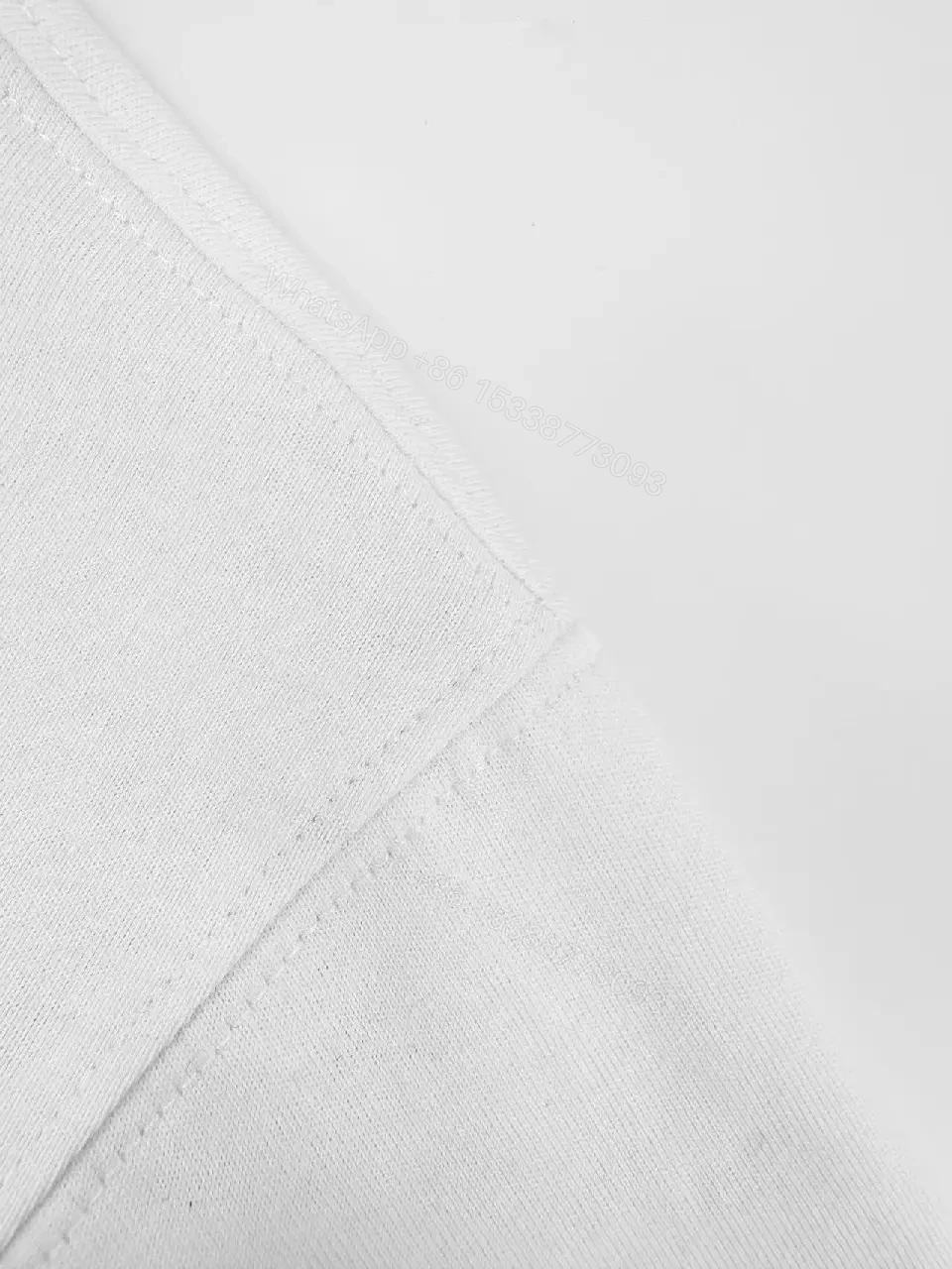 View 6 of White Cotton Crew Neck T-Shirt with Burberry Logo Graphic