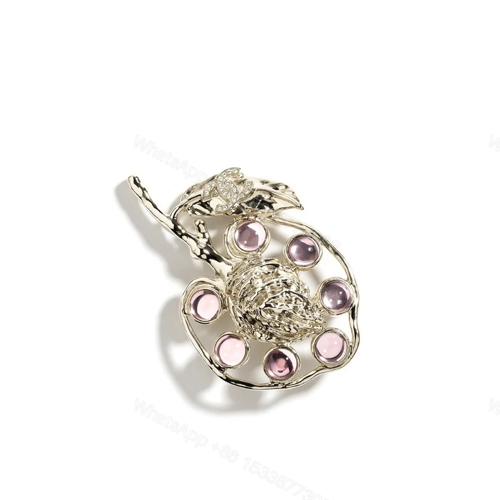 Chanel Brooch Metal Glass And Strass Gold Pink — view 1