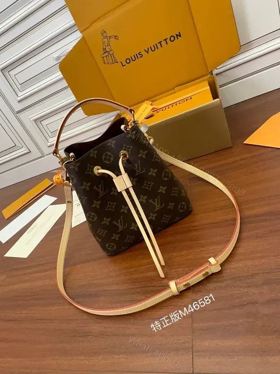Elegant Monogram Barrel Bag — LV Canvas, Leather Trim, Adjustable Strap, Day-to-Night Luxury — view 1
