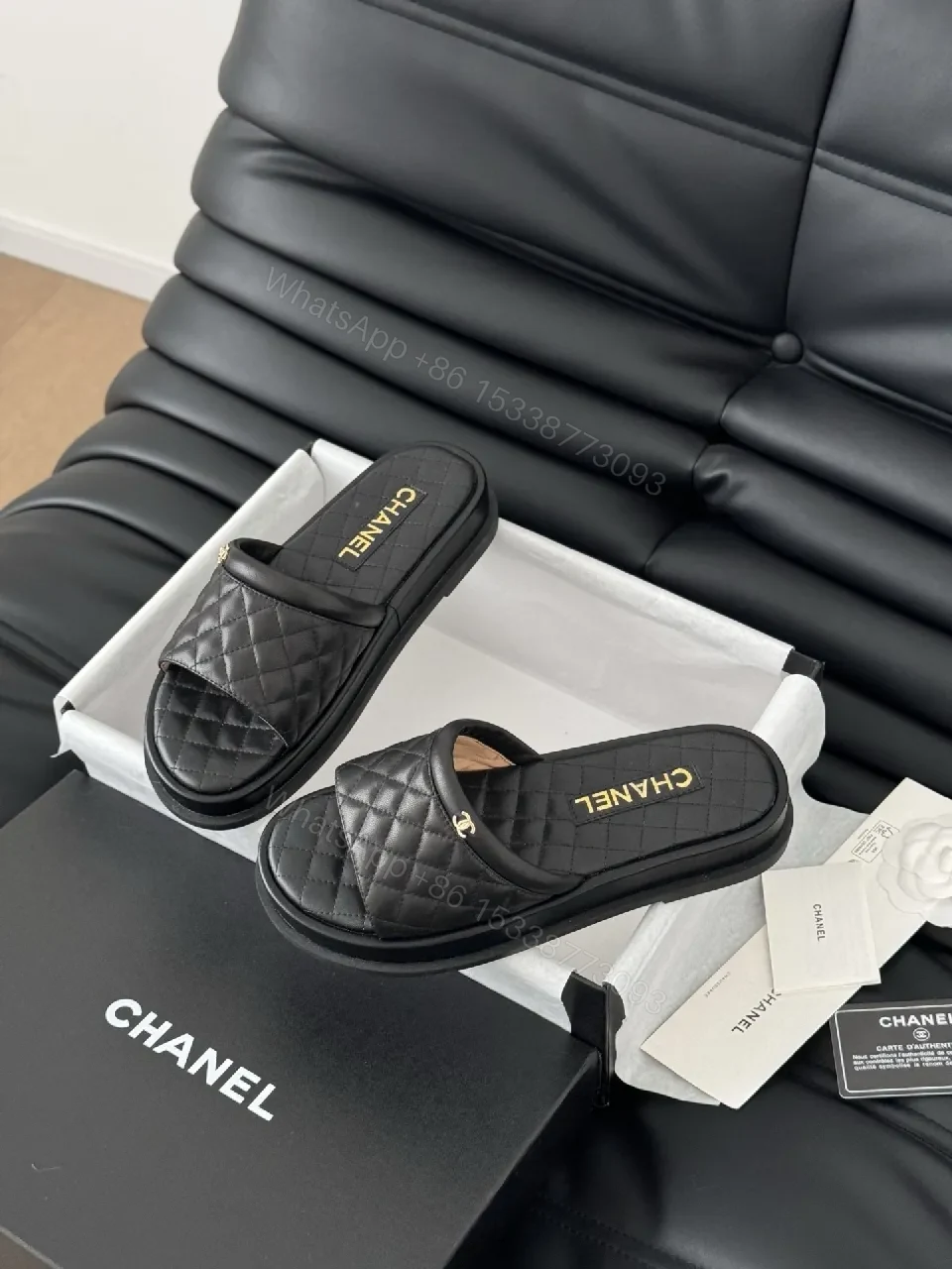 View 8 of Quilted Black Slip-Ons with Gold Logo - Luxe Comfort Shoes