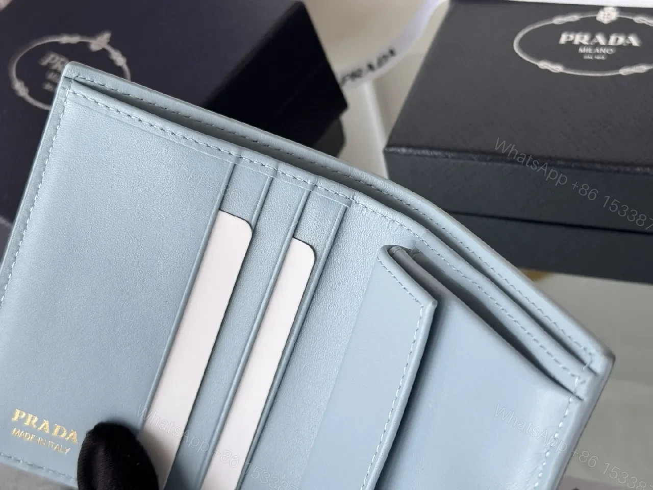 View 7 of Blue Saffiano-Like Bifold Wallet with Triangle Closure, Minimal Luxury