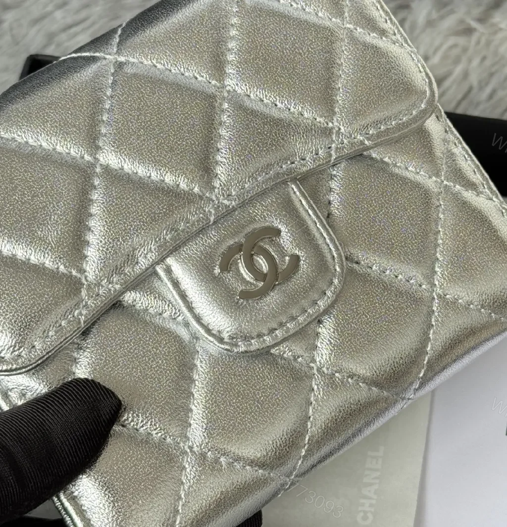 View 11 of Compact Silver Quilted Wallet with Signature Hardware