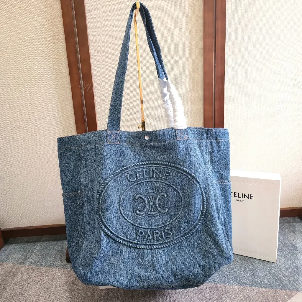 Denim Tote with Embossed Logo—Structured Luxury Tote — view 1