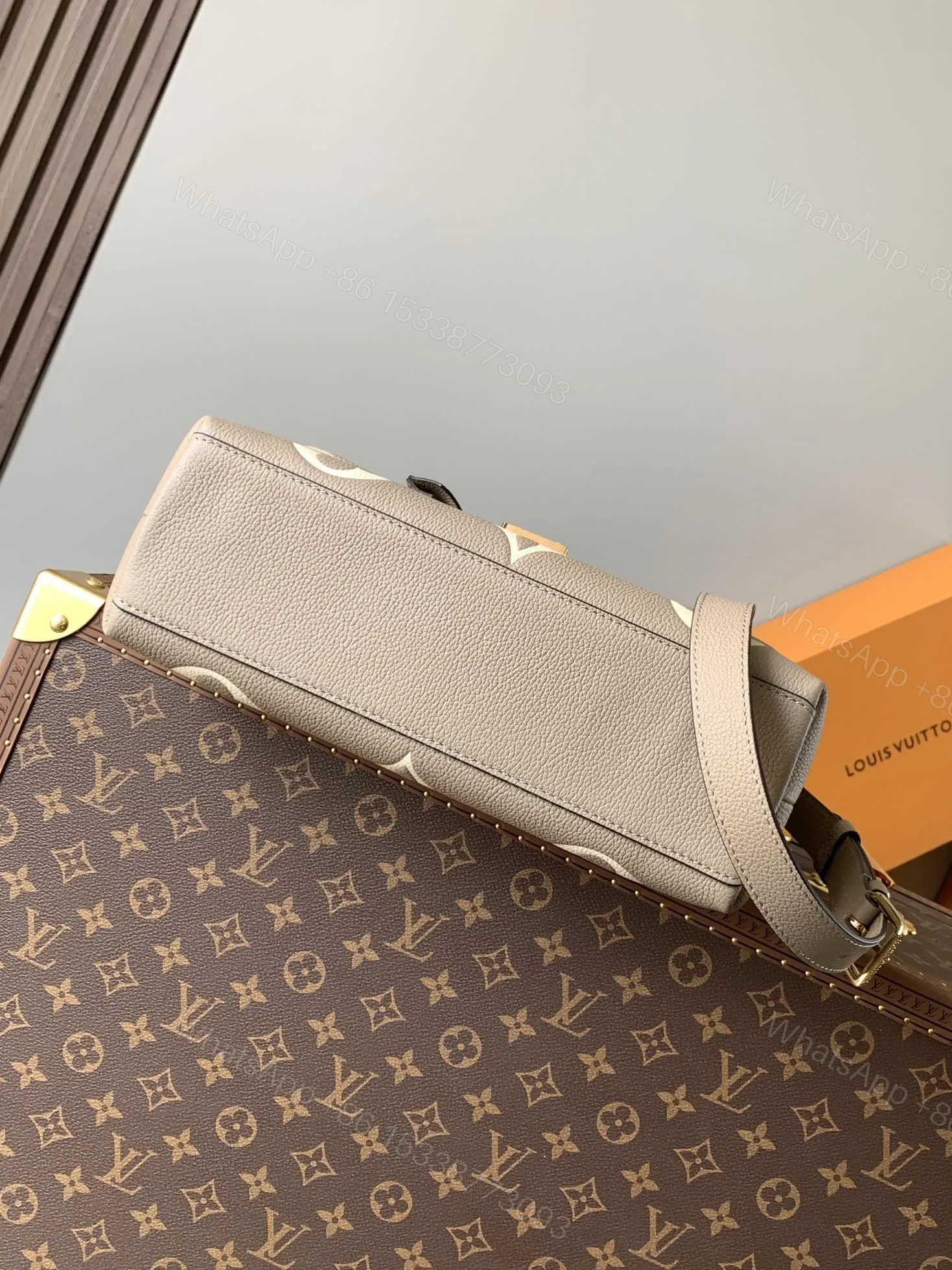 View 6 of LV MADELEINE 30 IN BEIGE MONOGRAM CALFSKIN EMBOSSED LOGO