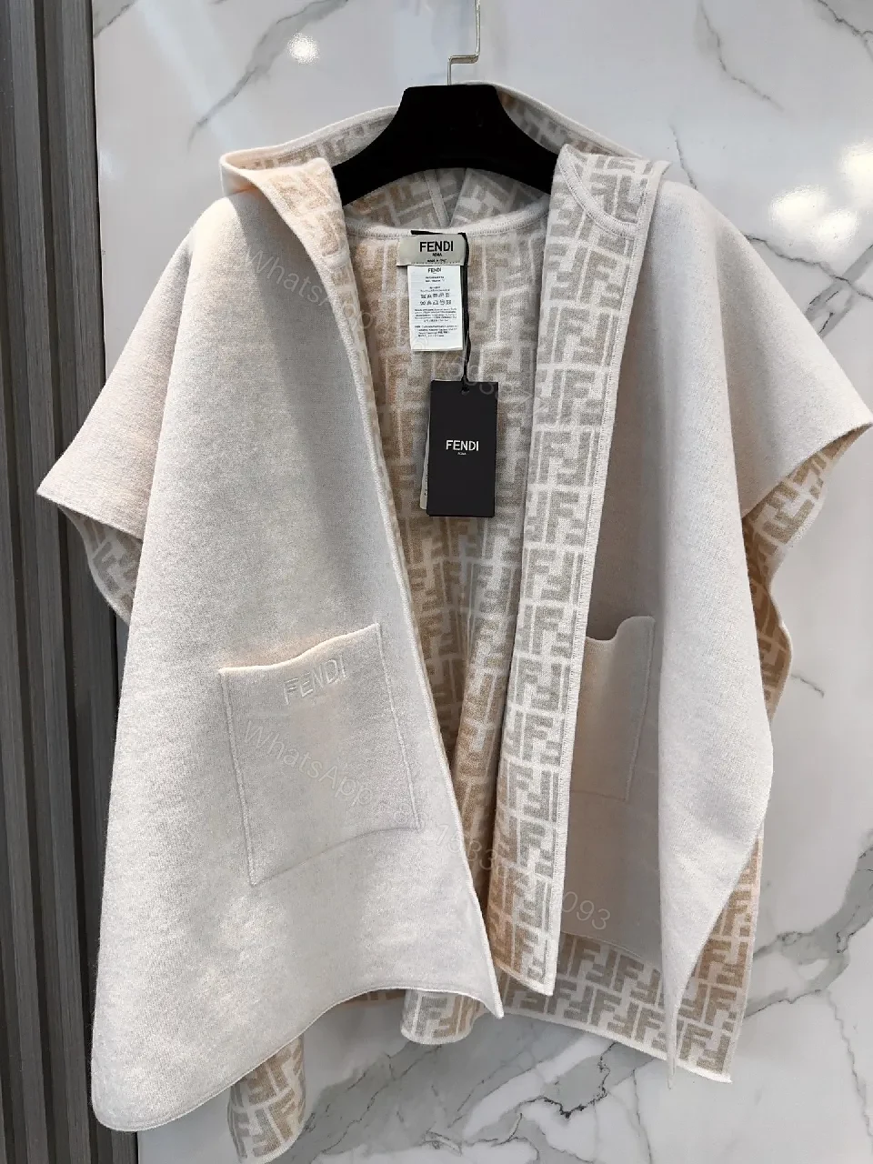 Soft-Neutral Knit Cape Jacket: Luxury Comfort & Signature Trim — view 1