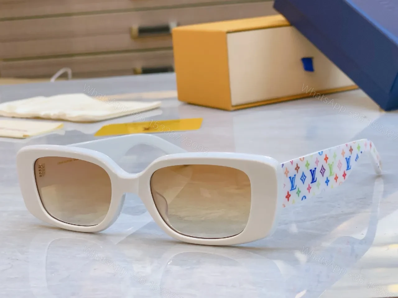 View 2 of Pink Frame Sunglasses with Multicolor Strap — Bold Luxury Sunnies