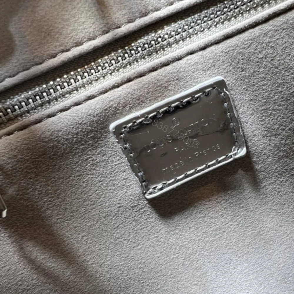 View 9 of Louis Vuitton Onthego PM Silver 25Cm M26373